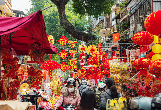 Every corner of the streets is immersed in the red glow to celebrate Tet holiday