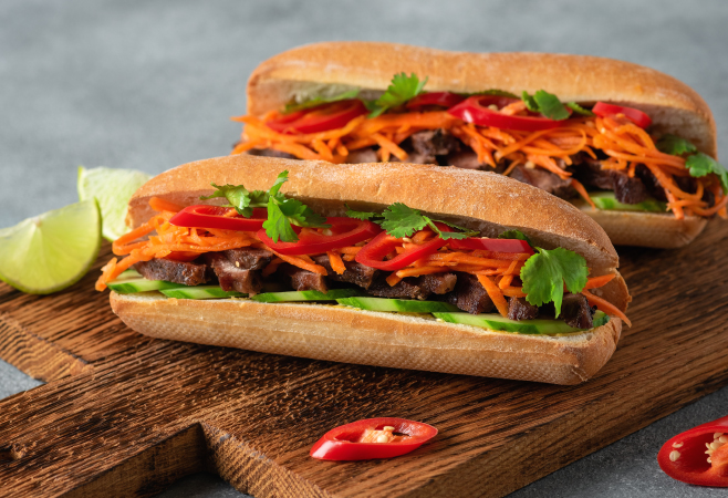 A crusty baguette filled with a variety of fillings is the fundamental component of banh mi Vietnamese food